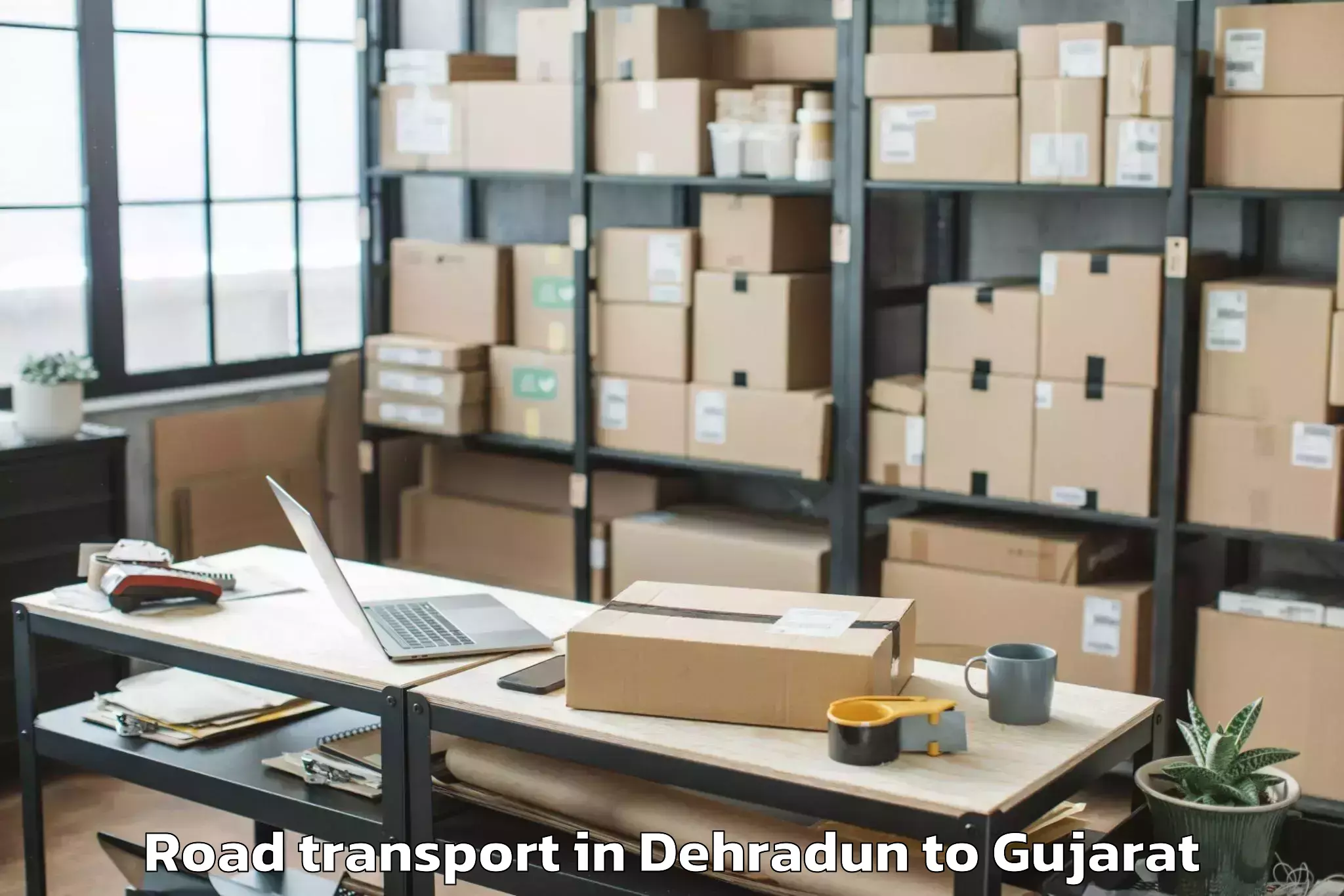 Get Dehradun to Gujarat University Of Transpla Road Transport